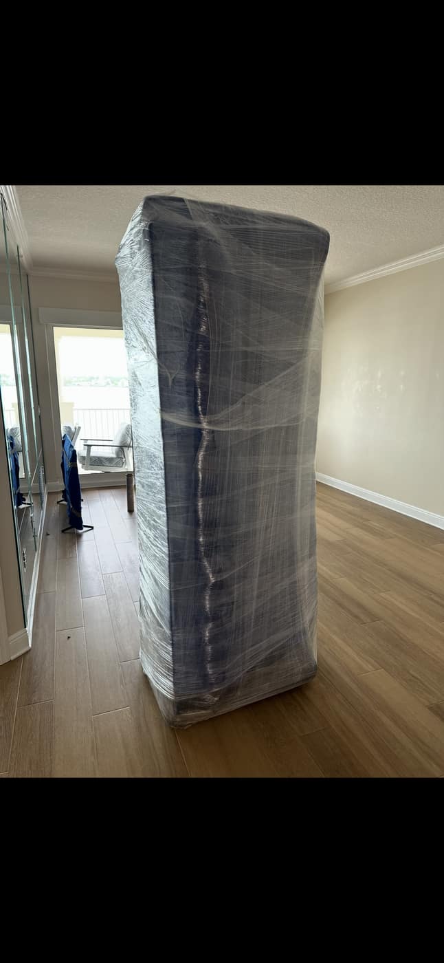 Mattress shrink-wrapped and protected for the move