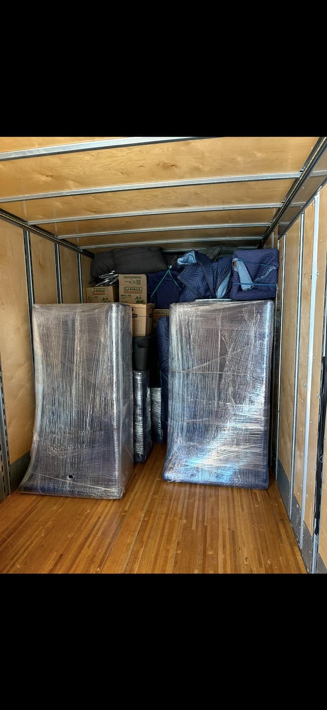 Shrink-wrapped furniture loaded in the truck