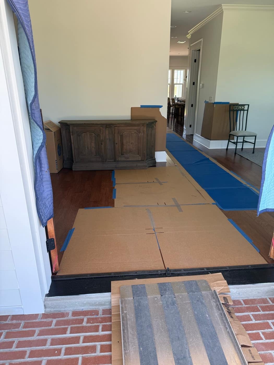 Padded furniture over protected flooring