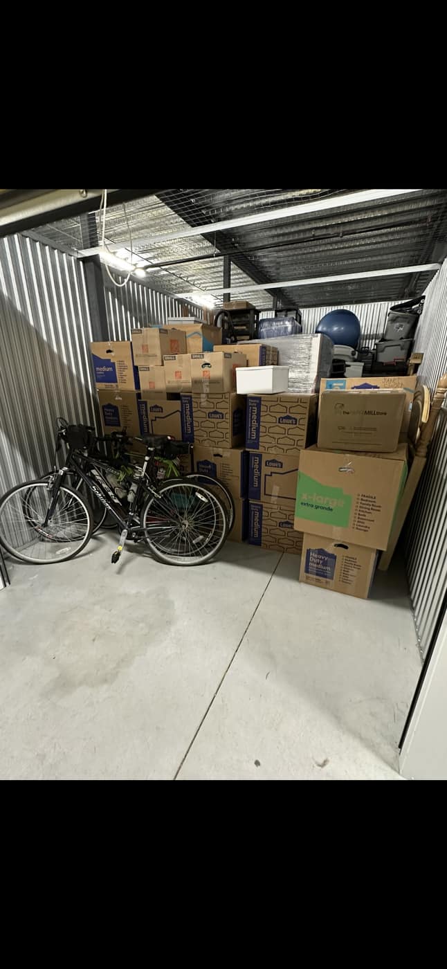 Organized storage unit with boxes neatly stacked
